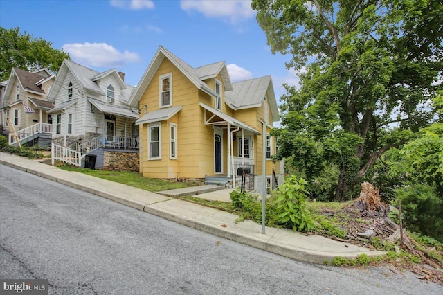 125 Cottage St, Waynesboro, PA 17268 - view of front of home featuring metal roof and a porch