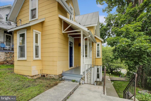 125 Cottage St, Waynesboro, PA 17268 - view of exterior entry featuring a standing seam roof and metal roof