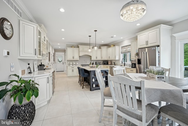 3357 Huntingdon Pike, Huntingdon Valley, PA 19006 - dining room featuring crown molding, a chandelier, recessed lighting, and light tile patterned flooring