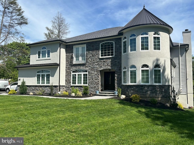 3357 Huntingdon Pike, Huntingdon Valley, PA 19006 - view of front of home featuring stone siding, a front yard, stucco siding, a standing seam roof, and metal roof