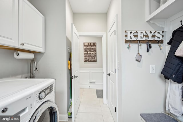 3357 Huntingdon Pike, Huntingdon Valley, PA 19006 - laundry area with cabinet space and light tile patterned flooring