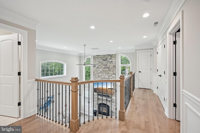 3357 Huntingdon Pike, Huntingdon Valley, PA 19006 - corridor with plenty of natural light, ornamental molding, light wood-type flooring, recessed lighting, and an upstairs landing
