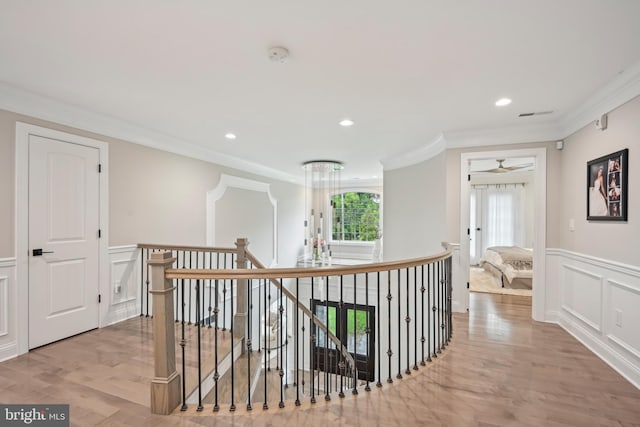 3357 Huntingdon Pike, Huntingdon Valley, PA 19006 - corridor featuring an upstairs landing, ornamental molding, a decorative wall, light wood finished floors, and a wainscoted wall
