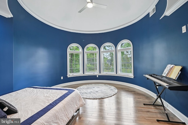 3357 Huntingdon Pike, Huntingdon Valley, PA 19006 - bedroom featuring crown molding, multiple windows, wood finished floors, baseboards, and a ceiling fan