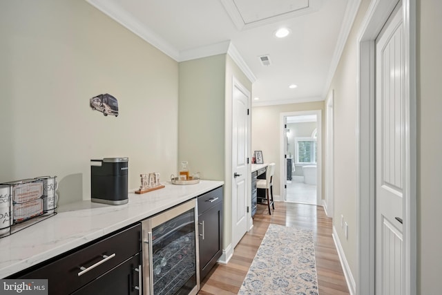 3357 Huntingdon Pike, Huntingdon Valley, PA 19006 - indoor dry bar featuring wine cooler, crown molding, light wood-style floors, recessed lighting, and baseboards