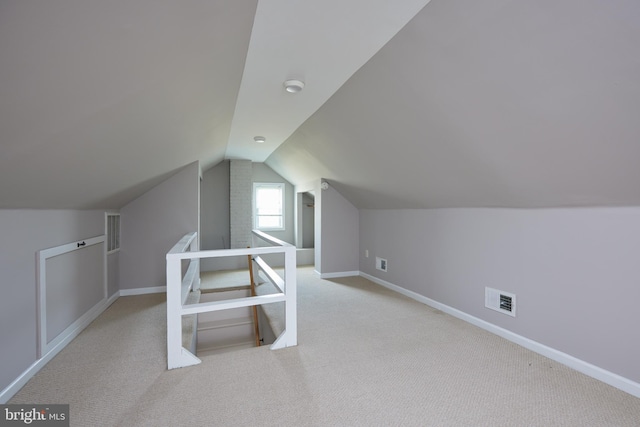 2208 S St NE, Washington, DC 20002 - bonus room featuring carpet flooring, baseboards, and vaulted ceiling