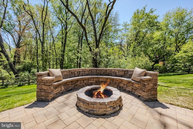 view of patio / terrace featuring a fire pit