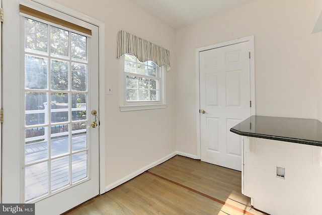 13407 Brookfield Dr, Chantilly, VA 20151 - doorway with light wood-type flooring and baseboards