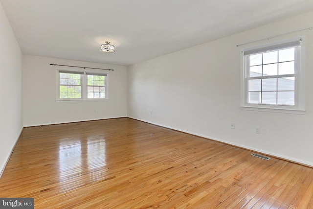 13407 Brookfield Dr, Chantilly, VA 20151 - empty room with light wood-style floors and baseboards
