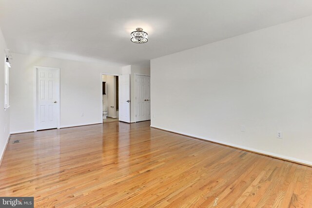 13407 Brookfield Dr, Chantilly, VA 20151 - spare room with light wood-type flooring and baseboards