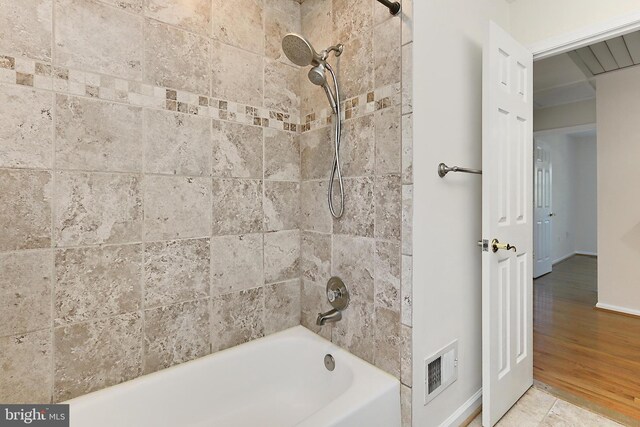 13407 Brookfield Dr, Chantilly, VA 20151 - bathroom with baseboards and tub / shower combination