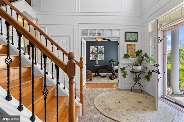 139 Watson Mill Rd, Landenberg, PA 19350 - foyer featuring a decorative wall, a towering ceiling, stairway, and a ceiling fan