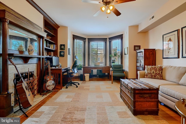 2636 N Calvert St N, Baltimore, MD 21218 - office area featuring a ceiling fan and wood finished floors