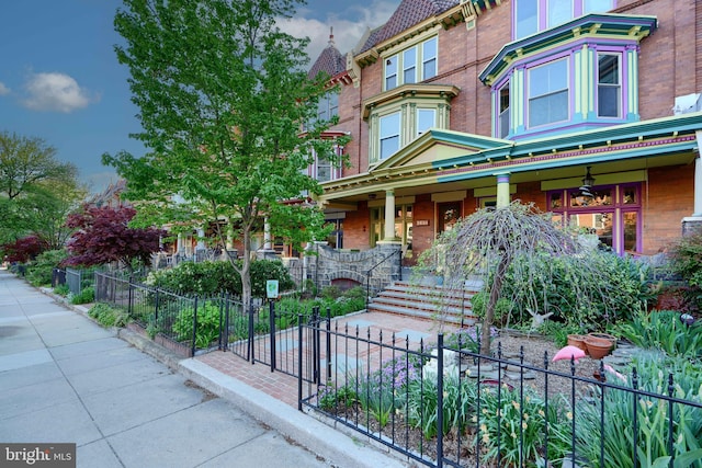 2636 N Calvert St N, Baltimore, MD 21218 - view of front of home with a porch and brick siding