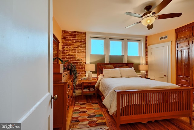 2636 N Calvert St N, Baltimore, MD 21218 - bedroom with wood finished floors and a ceiling fan