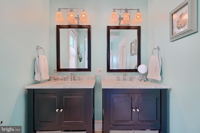 2636 N Calvert St N, Baltimore, MD 21218 - full bathroom featuring two vanities