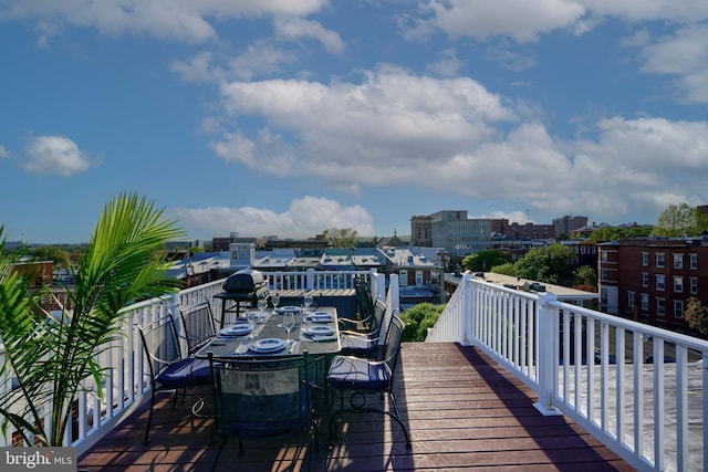 2636 N Calvert St N, Baltimore, MD 21218 - wooden terrace with outdoor dining area