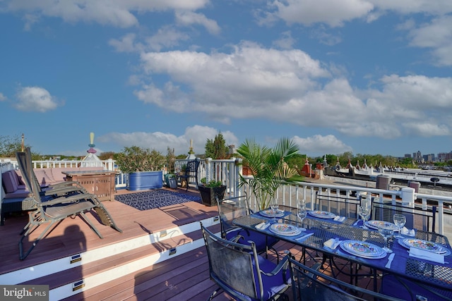 2636 N Calvert St N, Baltimore, MD 21218 - wooden deck with outdoor dining space