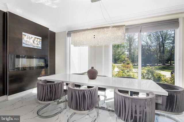 sunroom / solarium with a chandelier