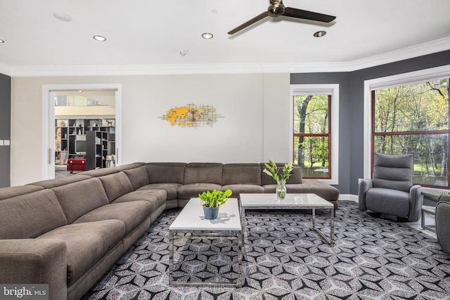 carpeted living area featuring ornamental molding, ceiling fan, recessed lighting, and baseboards