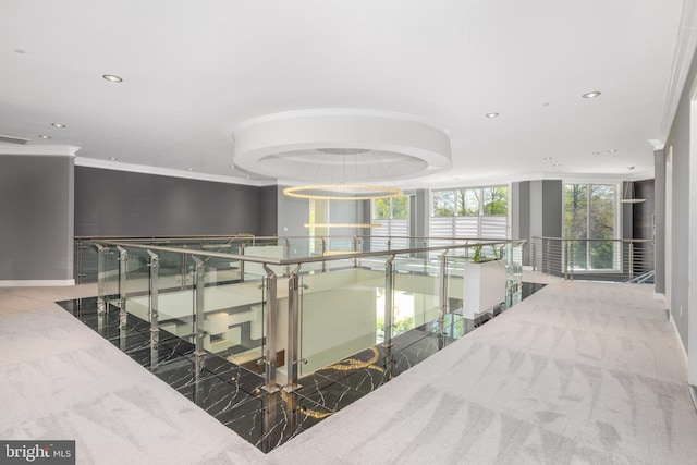hall featuring an upstairs landing, recessed lighting, ornamental molding, marble tiled flooring, and baseboards