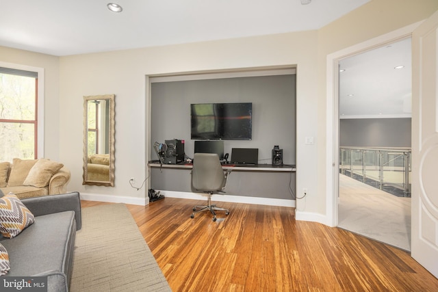 office area featuring wood finished floors, baseboards, and recessed lighting