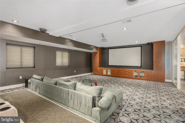 carpeted cinema room with baseboards and recessed lighting