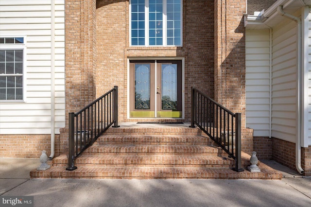 property entrance featuring french doors