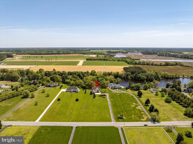 bird's eye view featuring a water view and a rural view