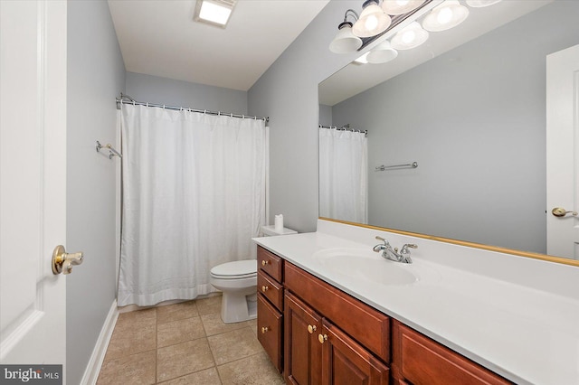 full bathroom featuring vanity, baseboards, tile patterned floors, and toilet
