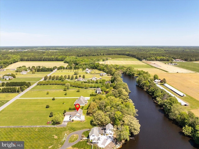 birds eye view of property with a water view and a rural view