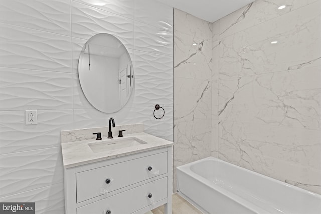 bathroom featuring vanity and a bathing tub