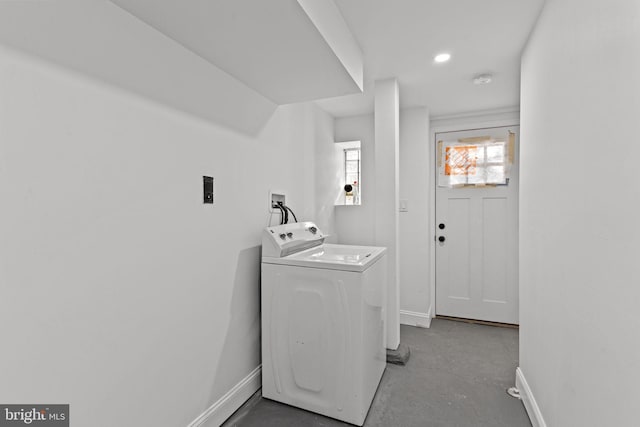laundry room with washer / clothes dryer, laundry area, and baseboards