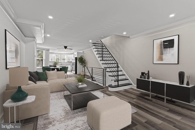 living area with recessed lighting, ornamental molding, stairs, and wood finished floors
