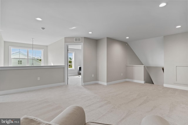 bonus room with baseboards, carpet, and recessed lighting