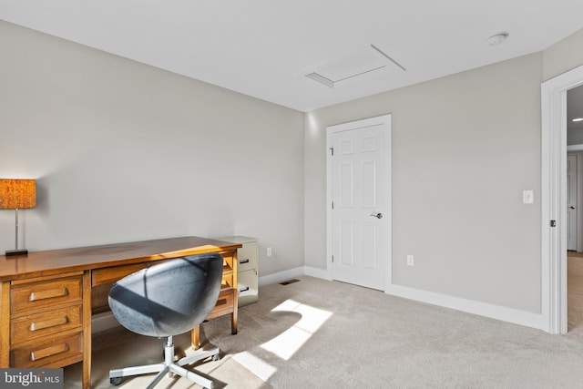 carpeted office featuring baseboards and visible vents
