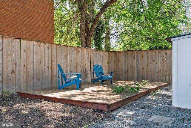 view of patio / terrace featuring a fenced backyard and a wooden deck