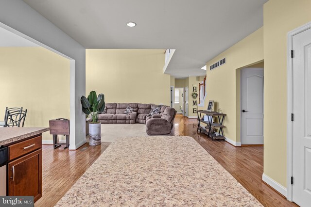 54 Durham Ln, Smyrna, DE 19977 - living area with wood finished floors, baseboards, and recessed lighting