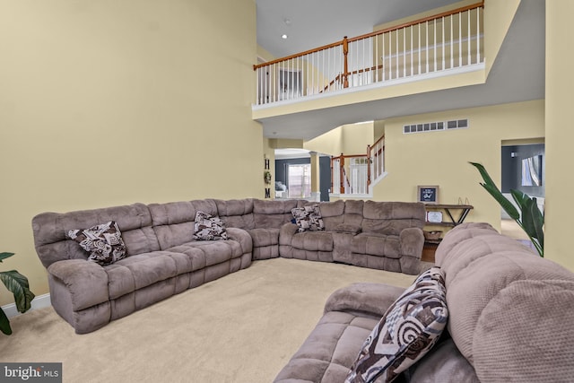 54 Durham Ln, Smyrna, DE 19977 - living area featuring carpet, a towering ceiling, stairway, and baseboards