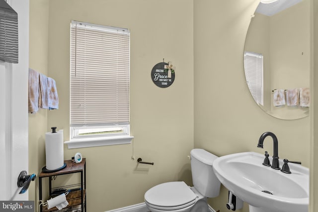 54 Durham Ln, Smyrna, DE 19977 - bathroom with a sink, toilet, and baseboards