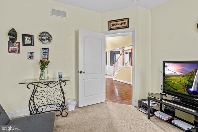 54 Durham Ln, Smyrna, DE 19977 - sitting room with carpet flooring, baseboards, and stairway