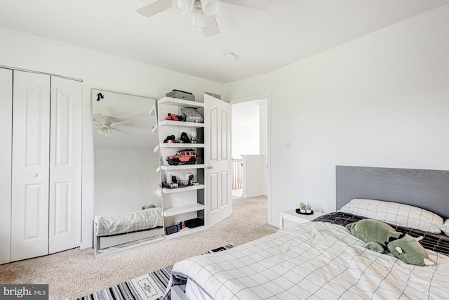 bedroom with carpet flooring, ceiling fan, and a closet