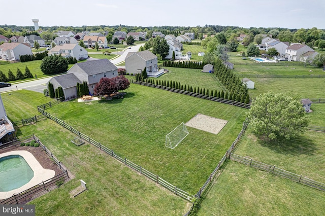 birds eye view of property featuring a rural view and a residential view