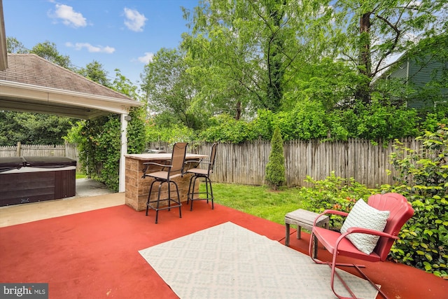 13446 Overbrook Ln, Bowie, MD 20715 - fenced backyard with a hot tub and a patio
