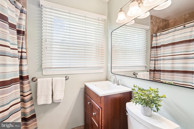 13446 Overbrook Ln, Bowie, MD 20715 - full bathroom with vanity, toilet, and a shower with shower curtain