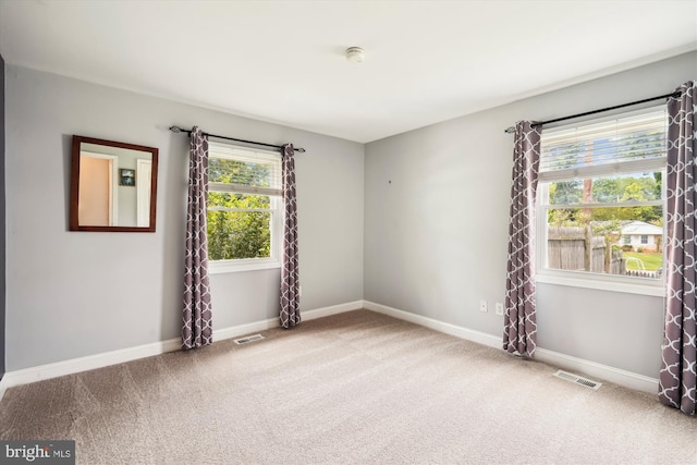 13446 Overbrook Ln, Bowie, MD 20715 - empty room featuring carpet floors, baseboards, and a smoke detector