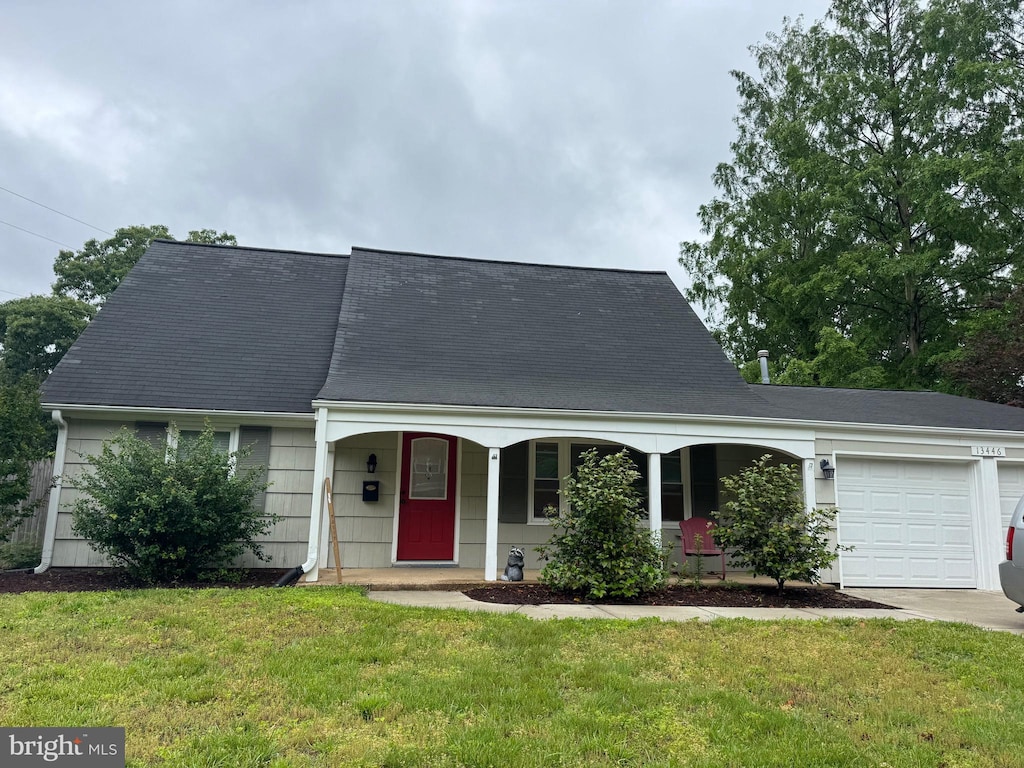 13446 Overbrook Ln, Bowie, MD 20715 - new england style home featuring covered porch, an attached garage, a front lawn, and driveway