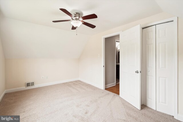 13446 Overbrook Ln, Bowie, MD 20715 - additional living space with lofted ceiling, carpet, a ceiling fan, and baseboards
