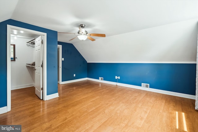13446 Overbrook Ln, Bowie, MD 20715 - additional living space with ceiling fan, lofted ceiling, wood finished floors, and baseboards