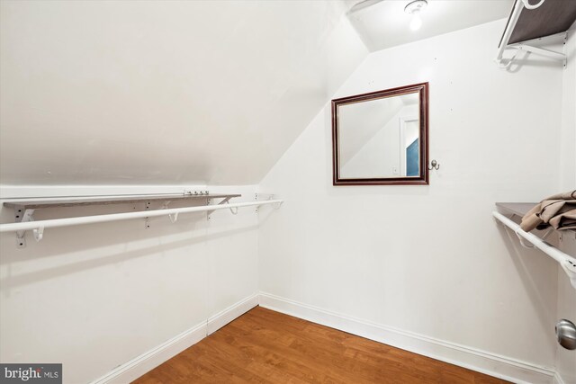 13446 Overbrook Ln, Bowie, MD 20715 - walk in closet featuring wood finished floors and vaulted ceiling
